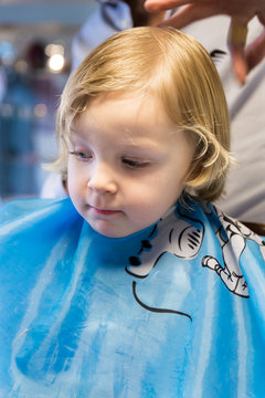 Little boy at the barbershop