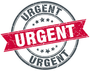 urgent red round grunge vintage ribbon stamp