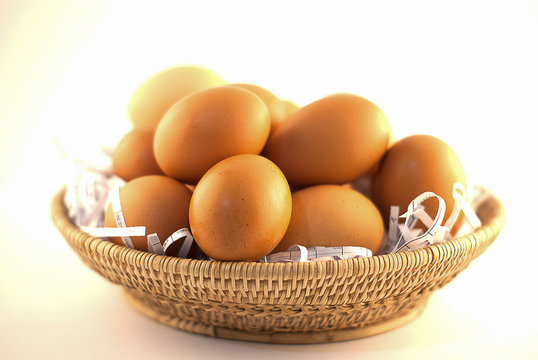 Brown eggs in basket
