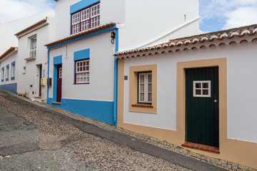 Traditional Portuguese street. With the paving stones in the street.