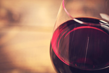 Macro of a glass of wine with shallow focus on the glass lip
