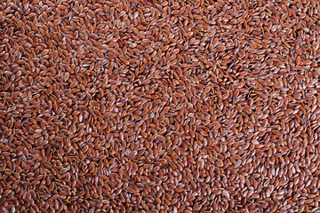 Wallpaper of flaxseed. Background of linseed.