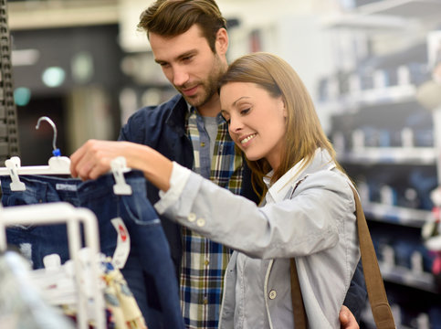 Couple shopping together in clothing store