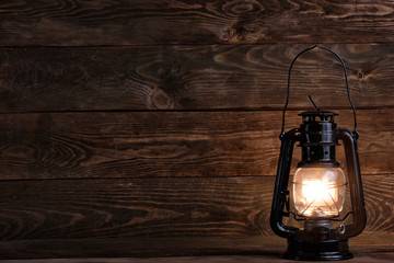 Wooden background and gas lamp