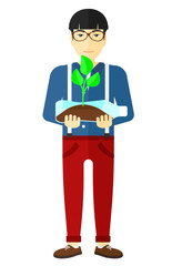 Man with plant growing in bottle.