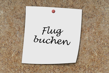Flug buchen written on a memo