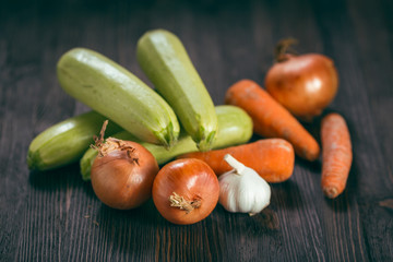 Vegetables on a dark wooden background