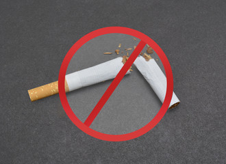 No Smoking sign on broken cigarette