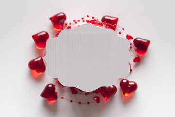 White paper label on red and white background