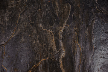 Fototapeta na wymiar dark grey stone Rock Texture