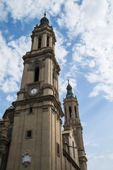 Fototapeta na wymiar towesr of Basilica of Our Lady of the Pillar in Zaragoza, Spain