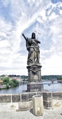 Fototapeta na wymiar Prague.Charles bridge. Statue of St John the Baptist