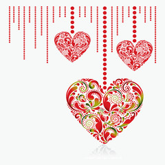 Valentine's Day card. Beautiful red hearts on a white background