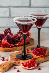 pomegranate cocktail  and ripe red pomegranate