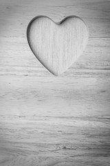 Fototapeta na wymiar Kitchen board with heart shape as border frame