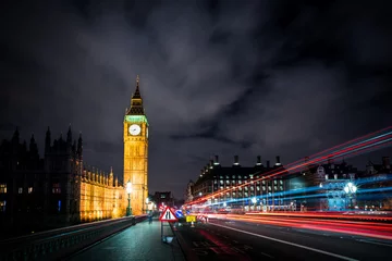 Fototapeten Westminster passing lights dark © oliverhuitson
