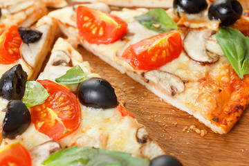 Sliced Pizza with mushrooms and vegetables