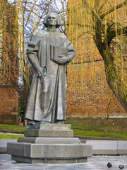 Monument of Yuriy Drohobych near the bell tower of St Bartholomew Church, Drohobych, Ukraine