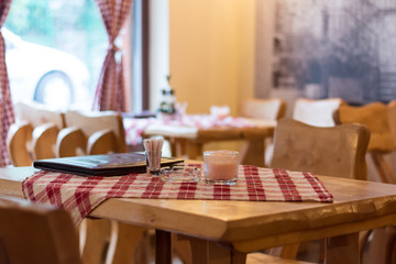 Tavern table with menu book