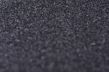 Black giltter bokeh abstract background