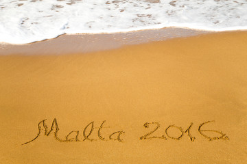 Message "Malta 2016" Written in Sand, summer background, sea and sand background