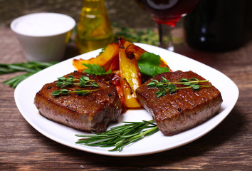 medium roast rib-eye steak with pepper, thyme and salt