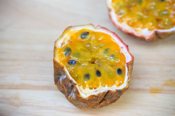 Passion fruit on wooden background