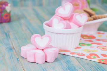 Valentine candies on color wood.selective focus.