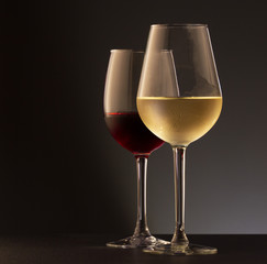 Glasses of red and white wine - 101682357