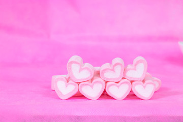 Obraz premium heart shaped candies on background,selective focus.