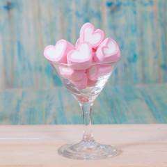 Colorful sweet marshmallow  in  glasses on table