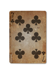 Very old playing card, seven of clubs