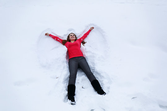  woman lies on snow