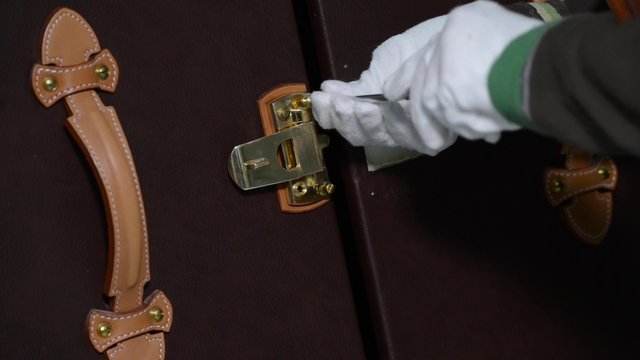 Trunk Maker at work in his luxury leather workshop