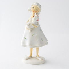 MOSCOW, RUSSIA - FEBRUARY 01, 2016: Statuette of a girl and a ca