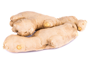 Root ginger isolated on a white studio background.