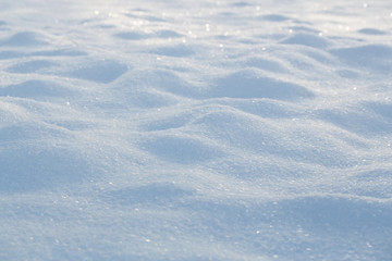 Natural winter background of fresh snow with copy space