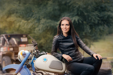 Biker Girl in Leather Jacket on Retro Motorcycle