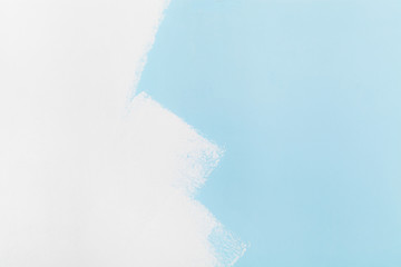 Naklejka na ściany i meble Close up of blue and white painted wall
