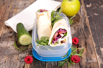 sandwich wrap with vegetables and fruits