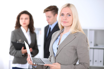 Fototapeta premium Beautiful cheerful smiling business woman
