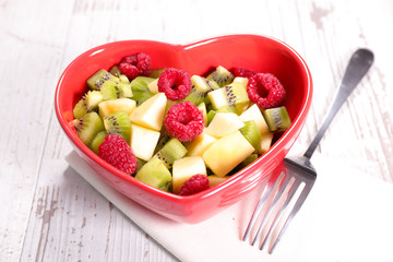 fruit salad in heart shaped bowl