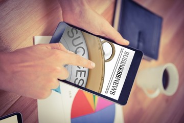 Composite image of close up on newspaper 