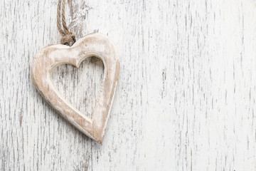 Heart on wooden background