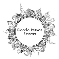Round frame of black and white doodle leaves 
