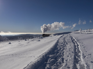 Fototapeta premium Dampflok im Winter