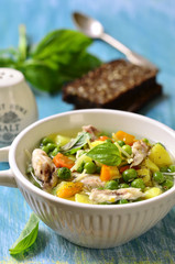 Vegetable soup with chicken and vermicelli.