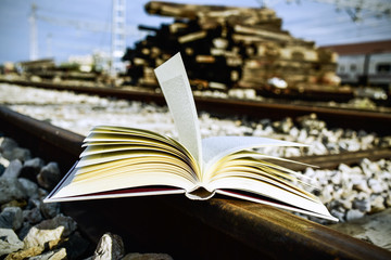 book on the railroad tracks