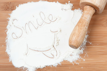 smile word on white flour.