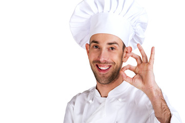 Professional chef man. Isolated over white background. Showing p